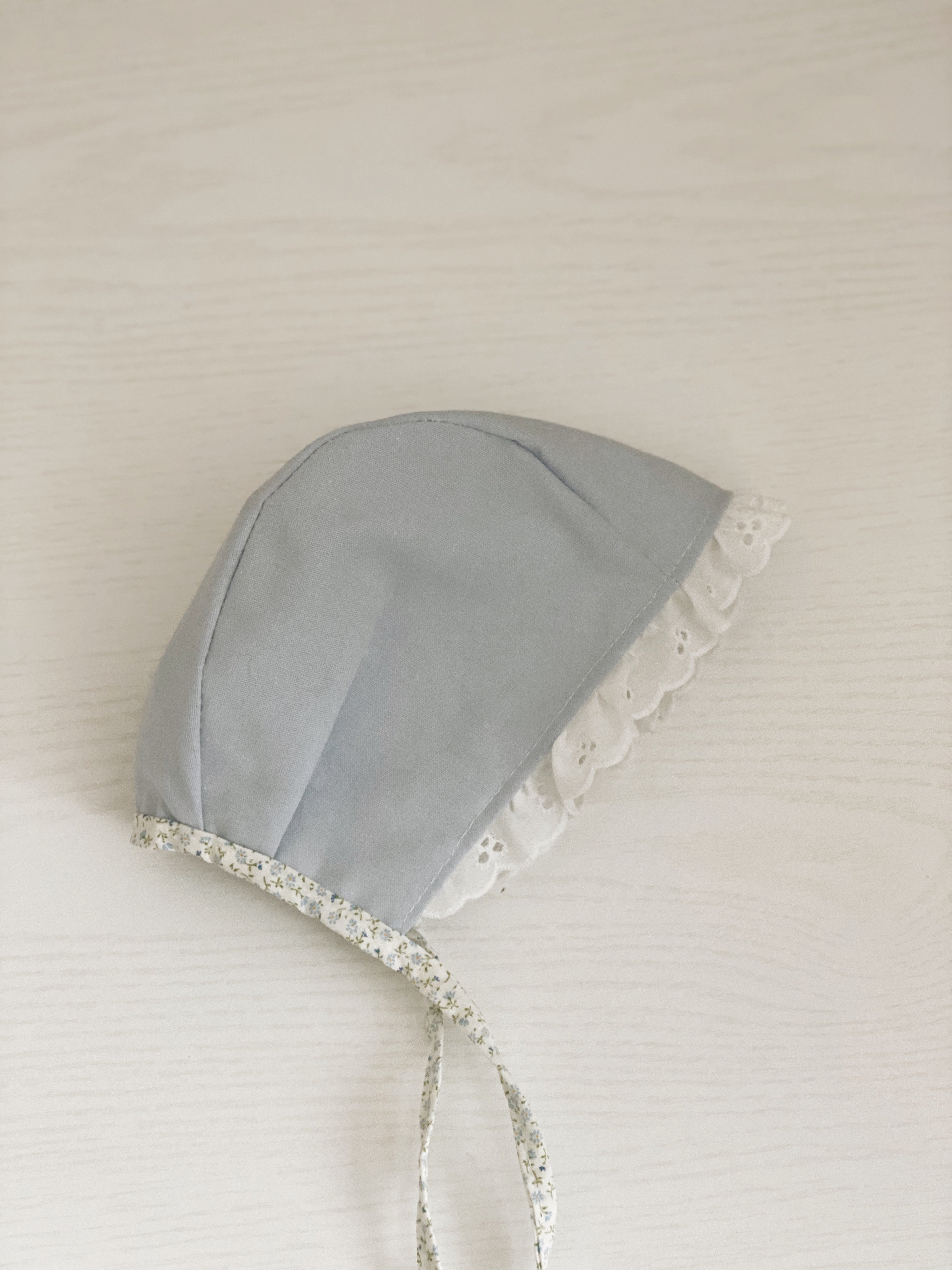 Blue  floral eyelet bonnet